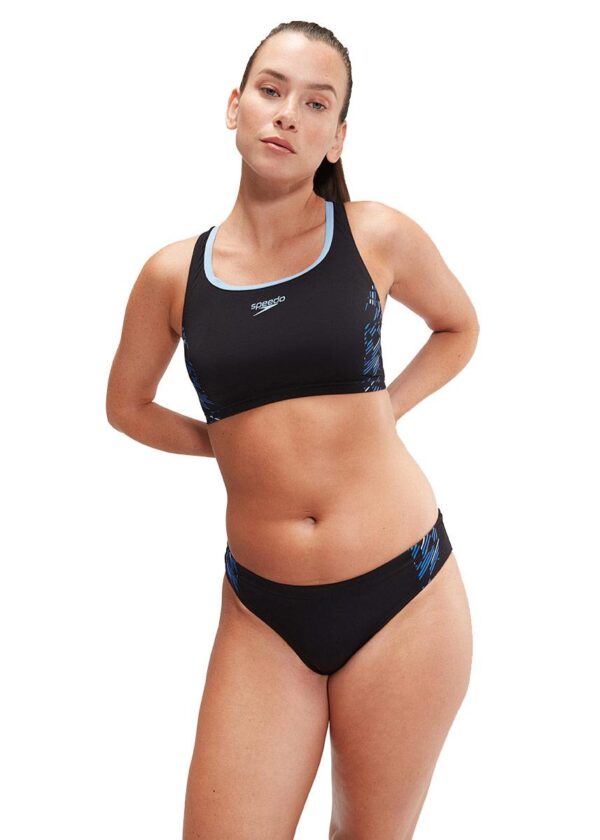 Lady wearing Speedo Placement 2 Piece Swim Bikini with hands tied back - Black / Blue - Front view